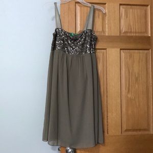 Brown sequins knee length dress.
